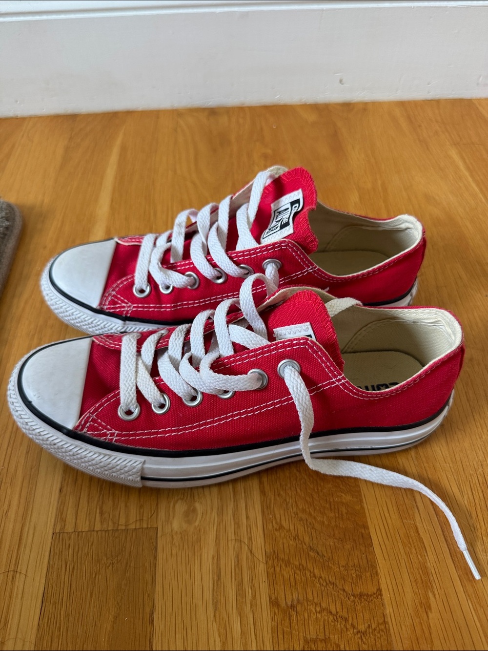 Red Low-Top Converse Sneakers - Classic Lace-Up